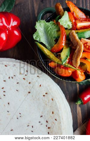 Top View Of Mexican Fachitos And Tortilla Bread.