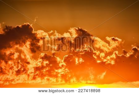Sunset With Clouds, Gloden Clouds And Setting Sun