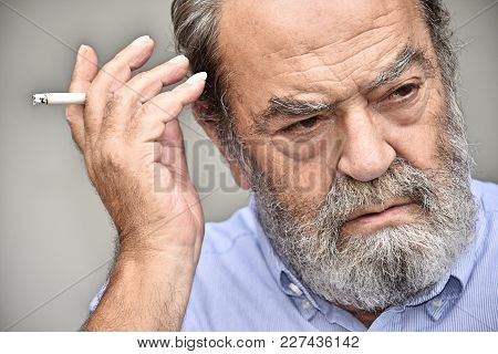 Bearded Old Male Smoking