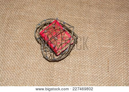 The Holy Quran In Mini Size In A Heart Shaped Cage