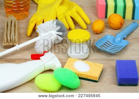 Ouse Cleaning Products On Wooden Table. Salt Pelets, Baking Soda (sodium Bicarbonate), Detergent, Sp