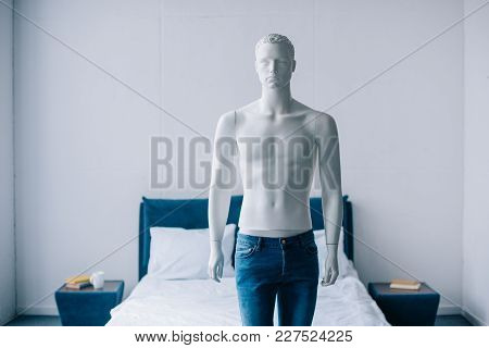 Close Up View Of Layman Doll In Jeans In Bedroom