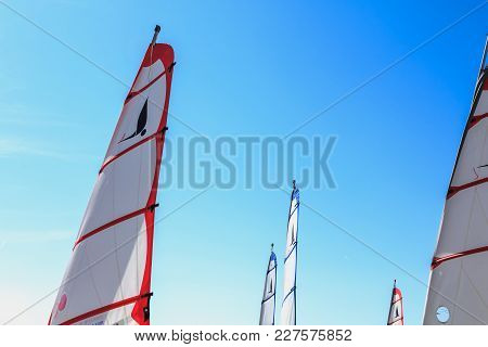 Closeup On Sails Of Sand Yacht On Blue Sky