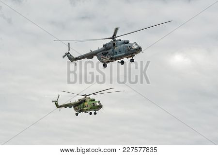 Tyumen, Russia - June 21, 2017: Army Games. Safe Route Contest. Pair Of Military Helicopter Mi-8 In 