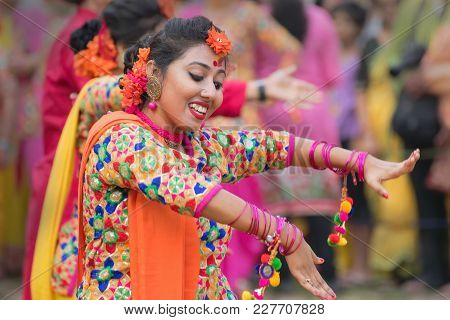 Young Girls Dancing At Holi / Spring Festival.