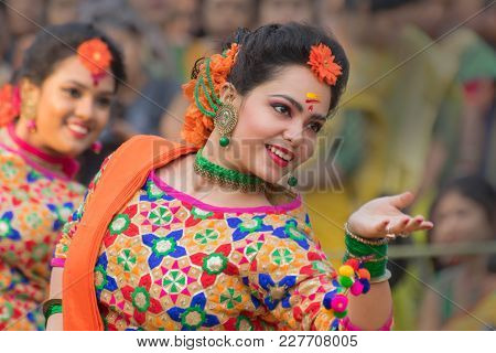 Young Girls Dancing At Holi / Spring Festival.