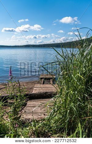 Broken Pier On The Lake's Coast