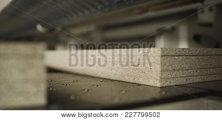 Cutting Sheets Of Material Wood Chipboard. Manufacture Of Wood Chipboard.