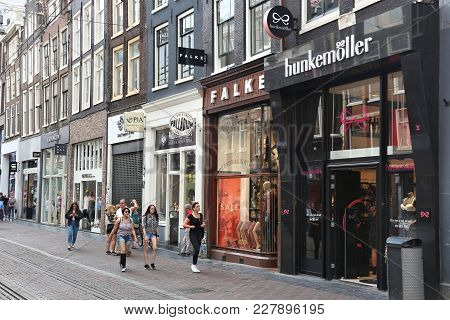 Amsterdam, Netherlands - July 8, 2017: People Shop At Leidsestraat Street In Amsterdam. Amsterdam Is