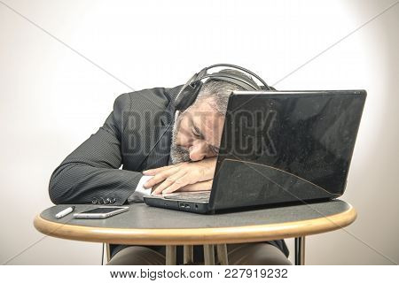 Senior Business Man Fallen Asleep With Hypnosis Self Help Audio Book, Exhausted And Tired