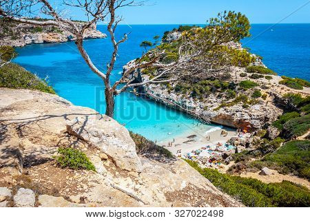 Calo Des Moro, Mallorca On A Sunny Day With People On The Beach