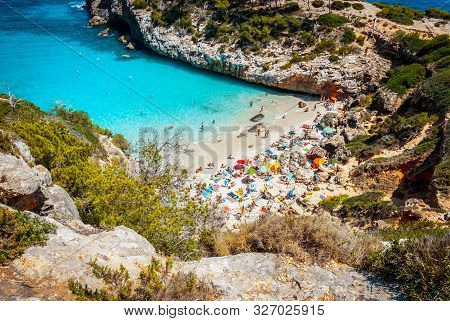 Calo Des Moro, Mallorca On A Sunny Day With People On The Beach