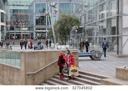 Manchester, Uk - April 21, 2013: People Visit Arndale Center In Shopping Area In Manchester, Uk. Gre