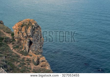 Neogene Limestone Rock With A Head Shape, 11-12 Million Years Old. Cape Kaliakra, Northern Black Sea