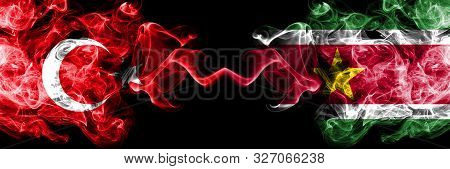 Turkey Vs Suriname, Surinamese Smoke Flags Placed Side By Side. Thick Colored Silky Smoke Flags Of T
