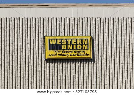 Kokomo - Circa September 2019: Western Union Signage And Logo. Western Union Sent Telegrams Over Tel
