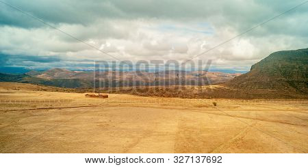 Desertic And Dry Landscape With A House In Chuquisaca State Of Bolivia