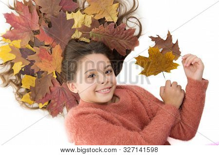 Prevent Dry Split Hair Ends. Child Enjoy Fall Season. Girl Cute Kid Long Hair Lay On White Backgroun