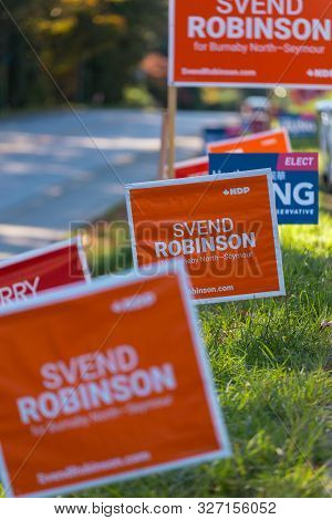 North Vancouver, Bc, Canada - Oct 10, 2019: Mp Candidate Signs Beside The Road Rallying For Voter Su