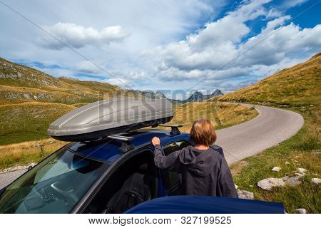 Woman With Car (model Unrecognizable) On Durmitor Panoramic Road. Picturesque Summer Mountain Landsc