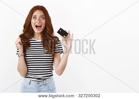 Cheerful Thrilled Cute Ginger Girl Triumphing, Pump Her Fist Joyfully, Scream From Excitement And Jo