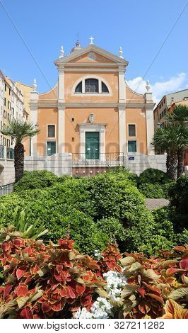 Ajaccio, A, France - August 25, 2019: Cathedral And Garden With Many Plants