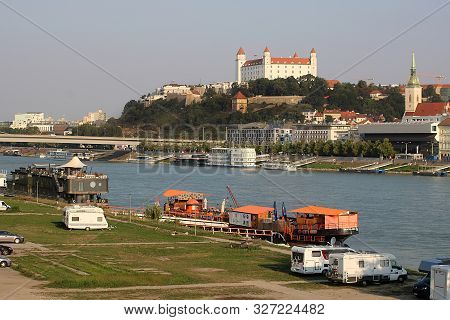 Bratislava, Slovakia - September 01, 2019: Travel Trailers On The Banks Of The Danube, Bridge Snp (l