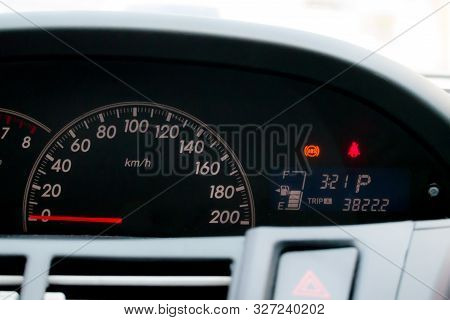 Car Instrument Panel Showing Speed, Fuel Level, Safety Belt, Time, And Miles
