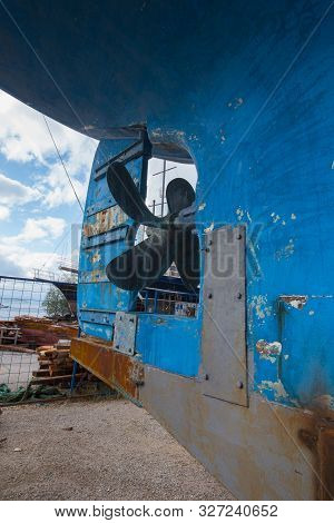 Old Propeller Screw In Outdoor Ship Repair Station. Boat Propeller