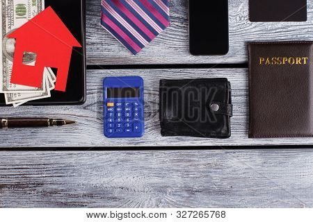 Passport, Purse And Cellphone. Different Objects On Wooden Surfice. Personal Things.