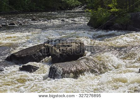 A Rock In The Middle Of A Rapid. Varatsky Rapids On The River Keret. Karelia, Russia, End Of June.