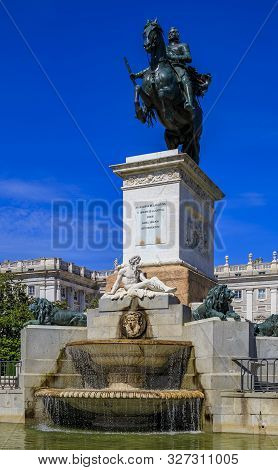 Large Equestrian Statue Of King Philip Iv In The Center Of Plaza De Oriente Near Royal Palace In Mad