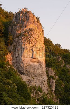 Decebal Head Sculpted In Rock. Danube Gorges (cazanele Dunarii) Romania.