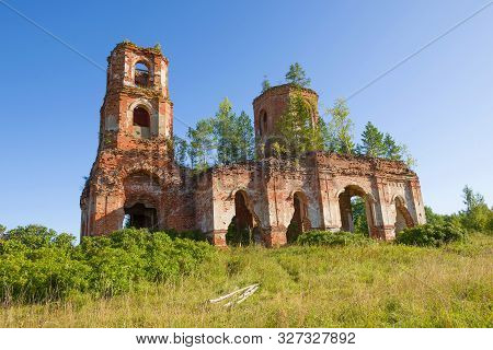 Abandoned Old Church Of The Icon Of The Mother Of God Of Kazan On A Sunny August Day. Ruskie Noviki.