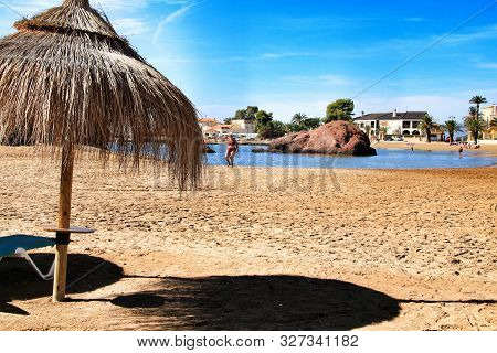 Mazarron, Murcia, Spain- October 3, 2019: People Swimming And Relaxing On The Beautiful Ermita Beach