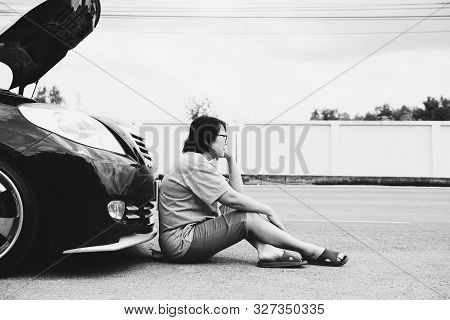 Woman Unhappy And Dismal From Car Engine Problem