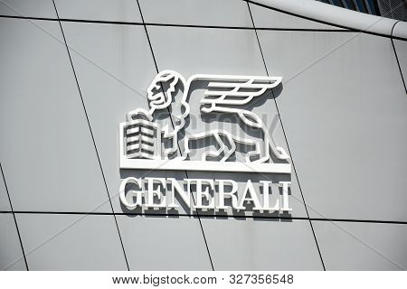 Milano, Italy, 14.07.2019: The Famous And Legendary Lion Of St. Mark Logo Of The Generali Group Sinc