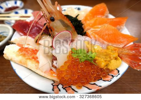 Raw Mixed Seafood Sashimi On Rice In A Bowl