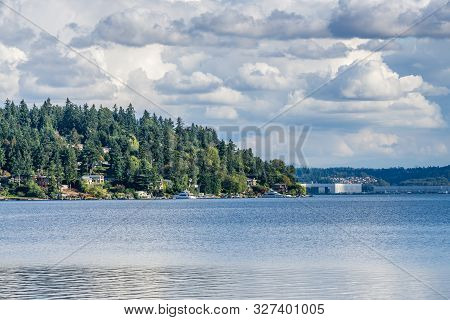 Billowing Clouds Hover Over Mercer Island In Washington State.