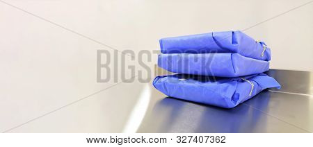 Wrapped Sterile Blue Sets. Wrapped Sterile Instruments.