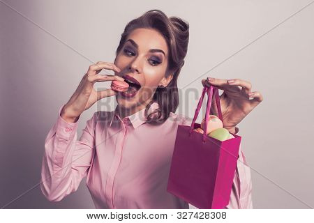 Funny Smiling Blond Woman Eating Colorful Macaroons