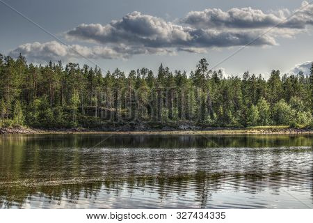 Hdr Shot With Tone Mapping Effect At The Stream Skelleftealven In Vasterbotten, Sweden