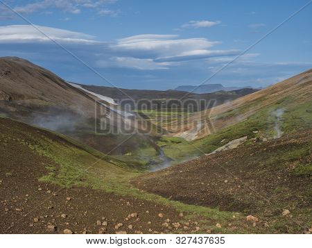 Landmannalaugar Colorful Rhyolit Mountains With Steam From Hot Spring On Famous Laugavegur Trek. Fja
