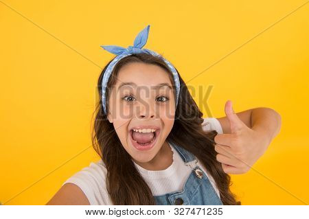 Turn Up The Thumb. Happy Little Child Give Approval With Thumb Up. Small Girl Smiling With Thumb Up 