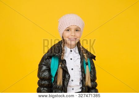 Future Focused Learning. Happy Little Schoolgirl Smiling On Yellow Background. Small Child In Autumn