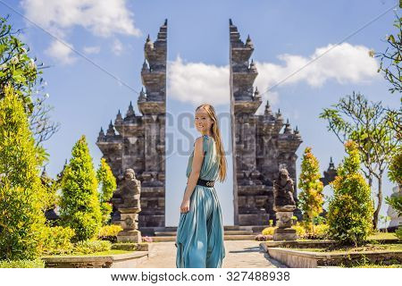 Young Woman Tourist In Budhist Temple Brahma Vihara Arama Banjar Bali, Indonesia