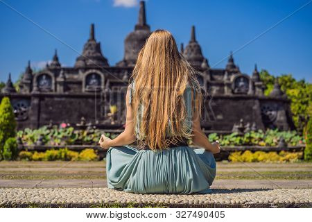Young Woman Tourist In Budhist Temple Brahma Vihara Arama Banjar Bali, Indonesia