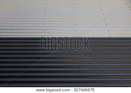 Wide Angle View Of Junction Of Black And White Ribbed Surfaces
