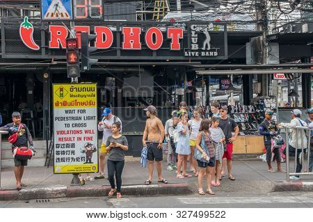 Patong, Phuket, Thailand - January 17th 2019: Tourists Waiting To Cross The Road At A Pedestrian Cro
