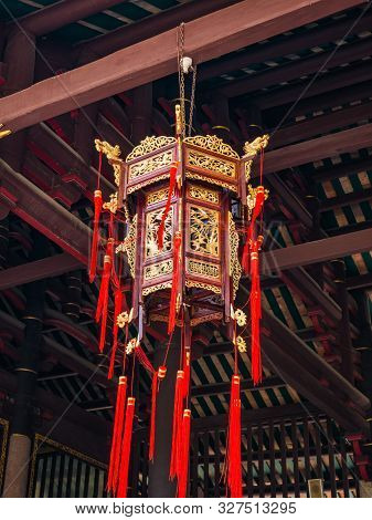 Chinese Red Lantern On The Ceiling In The Chinese Temple